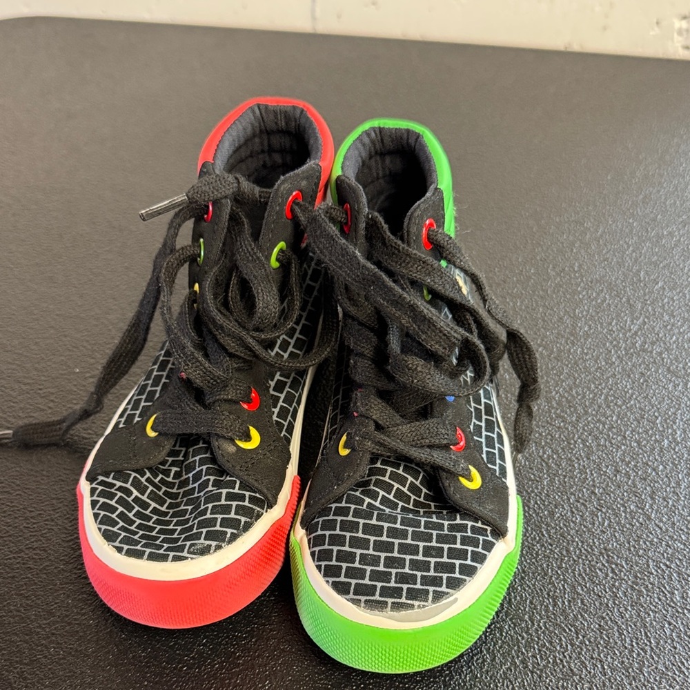 Nintendo Black Sneakers with Red and Green Accents